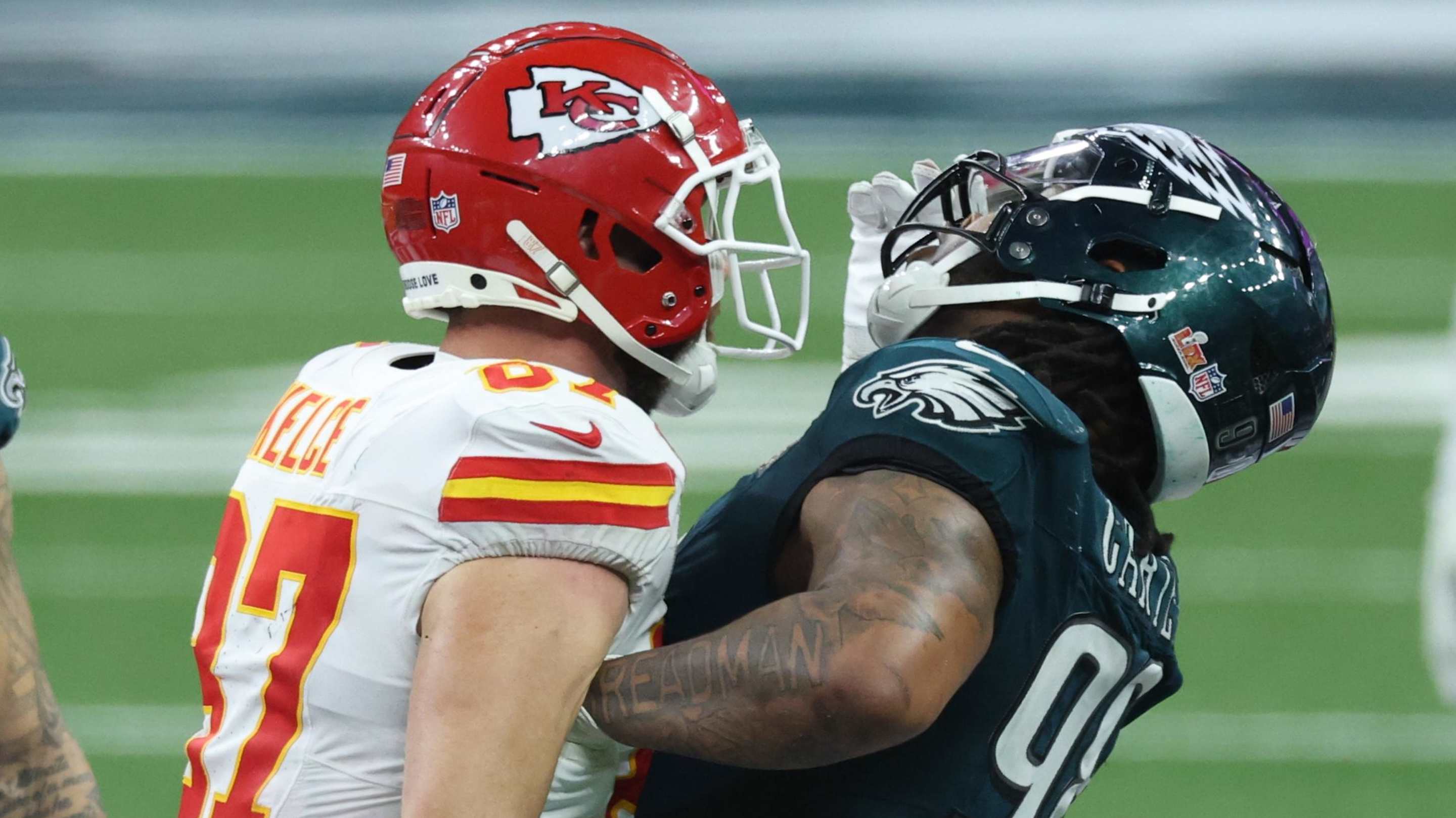 Feb 9, 2025; New Orleans, LA, USA; Kansas City Chiefs tight end Travis Kelce (87) bumps into Philadelphia Eagles defensive tackle Jalen Carter (98) in the fourth quarter in Super Bowl LIX at Ceasars Superdome. Mandatory Credit: Stephen Lew-Imagn Images