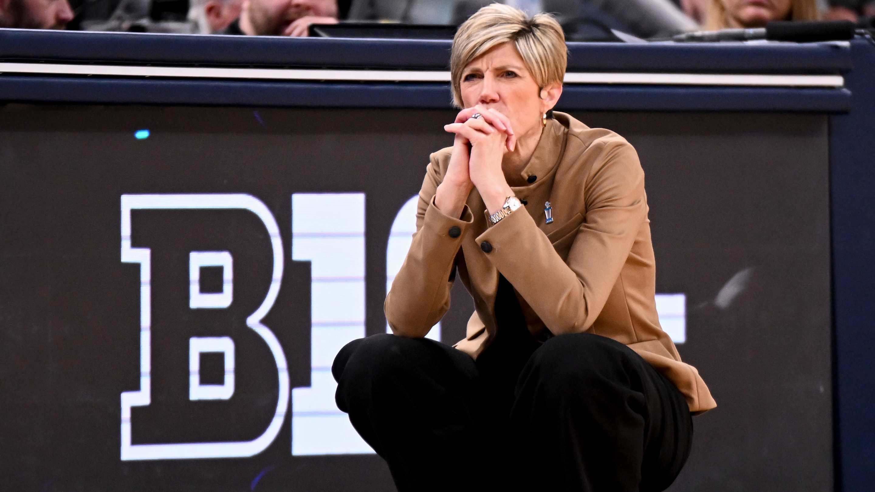 Mar 7, 2026; Indianapolis, IN, USA; Iowa Hawkeyes head coach Jan Jensen looks on against the Michigan Wolverines during the second half at Gainbridge Fieldhouse. Mandatory Credit: Robert Goddin-Imagn Images
