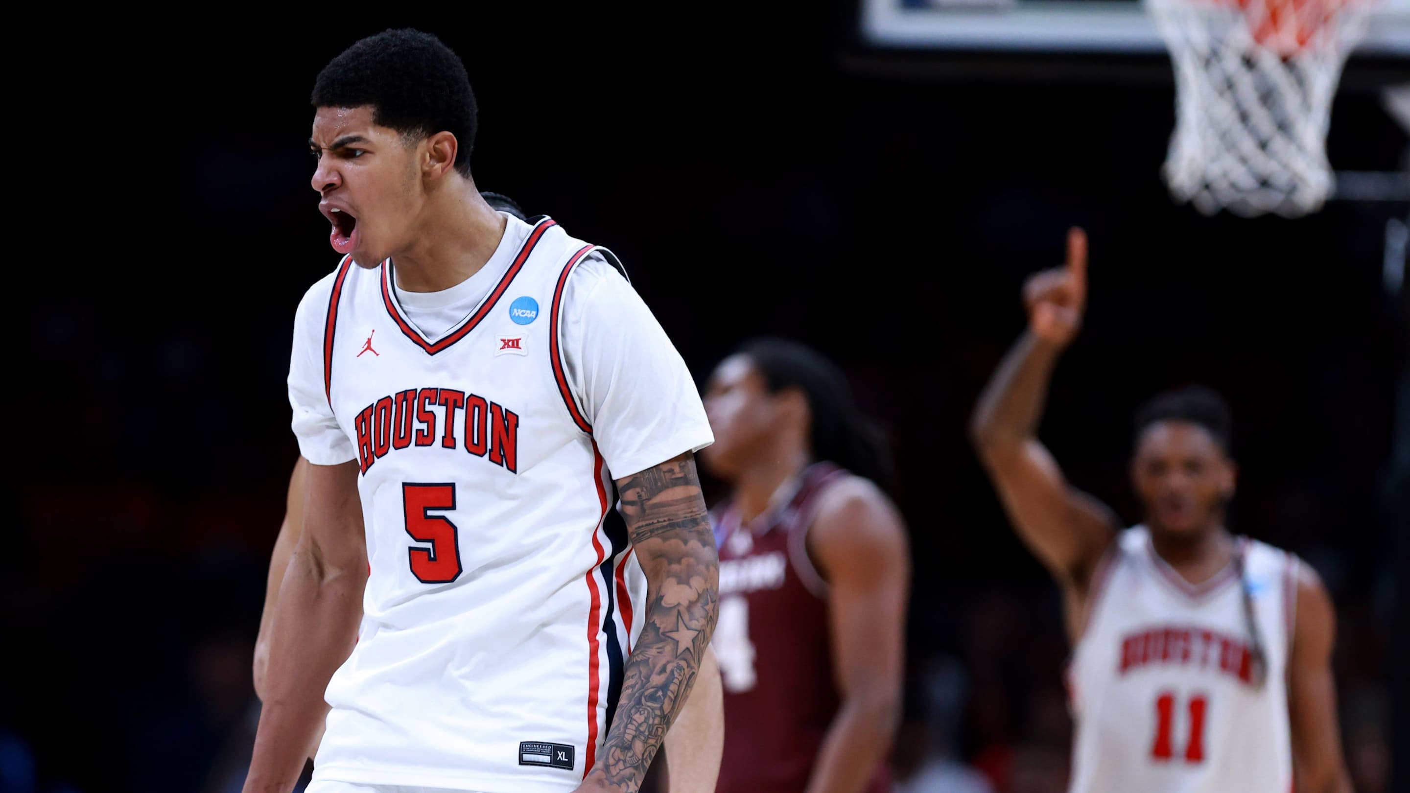 Houston's Chris Cenac Jr. (5) cheers during a second-round game in the NCAA men's basketball tournament between Houston Cougars and Texas A&M Aggies at Paycom Center in Oklahoma City, Saturday March 21, 2026.
