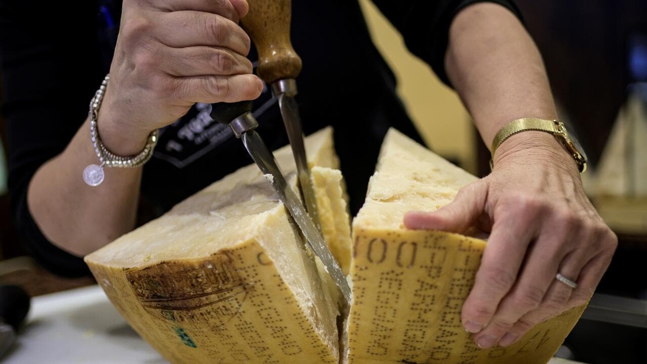 Parmesan exports doing grate... but sales melt in Italy